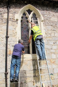 Aiano engineers installing the new window guards Aiano engineers matching the new window guards at St. Nicholas church