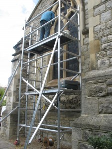 Aiano senior engineer, Steve, fixing the new window guards at St. Paul's Church Aiano senior engineer, Steve, fixing the new traditional window guards at St. Paul's Church