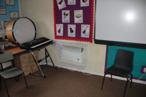 One of the AIANO Classic bespoke heater guards in the school music room