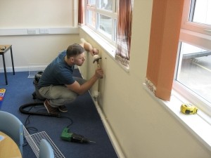 AIANO engineering installing bespoke radiator guards